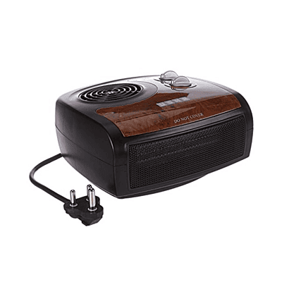 Close-up of the heating element and fan behind the grille of the Usha FH 1212.