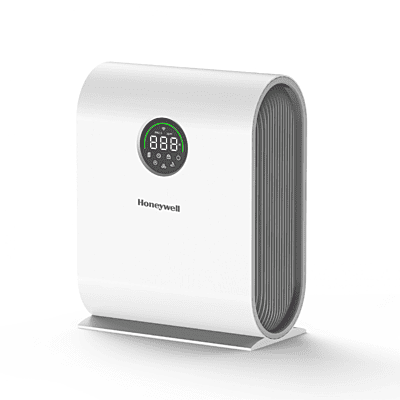 Honeywell Air Touch V5 Air Purifier for Home standing in a modern Delhi living room.