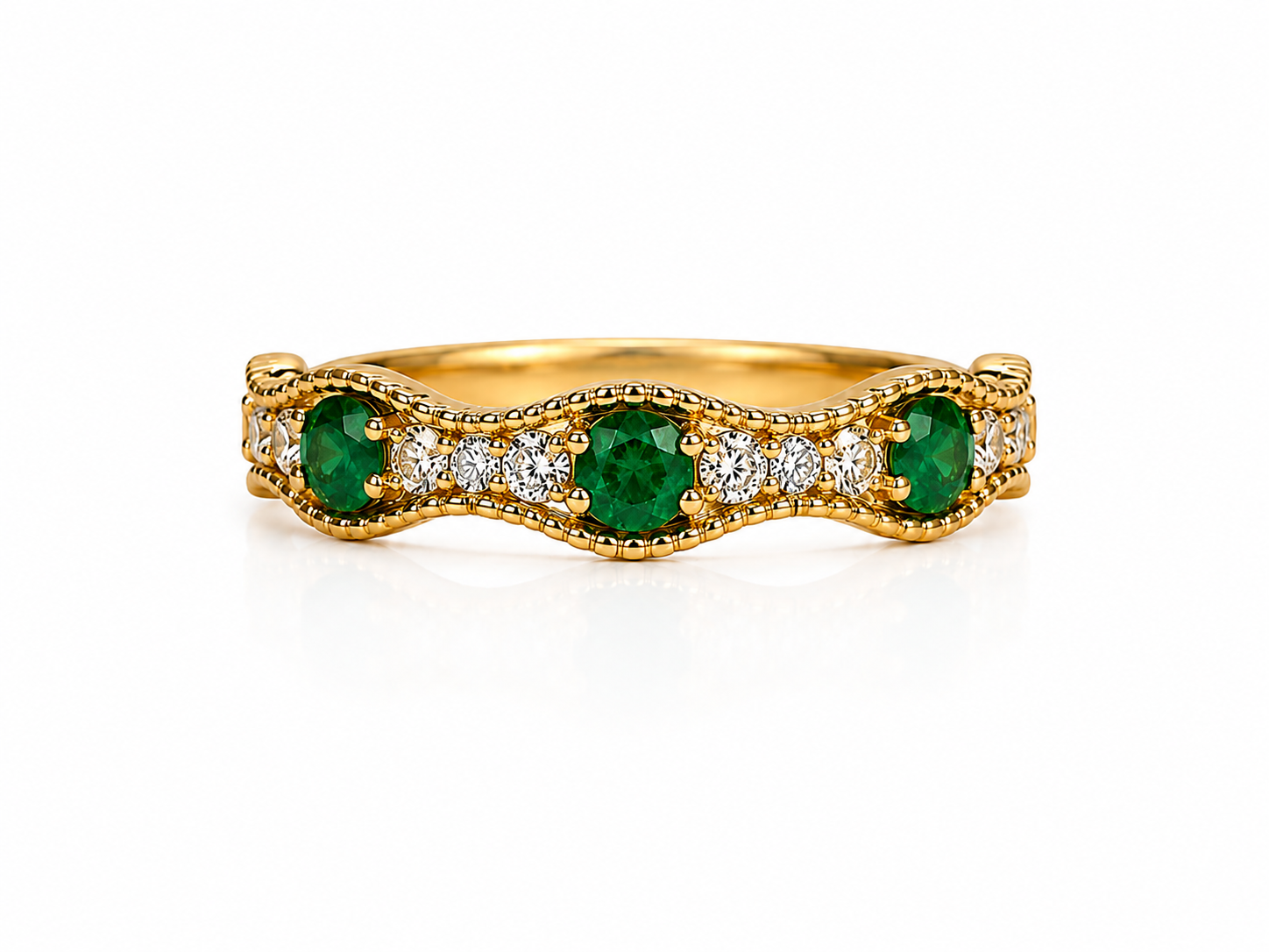 Anillo de oro con esmeraldas y diamantes