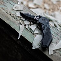 Smith & Wesson M&P SWMP1BS 7.1in S.S. Assisted Folding Knife with 2.9in Serrated Clip Point Blade and Aluminum Handle for Tactical, Survival and EDC , Black, 6 inch