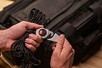 SOG Rapid Rescue Multi-Tool | Stainless Steel Seatbelt Cutter, GRN Handle, Aluminum Pull-Ring, Quick to Deploy from The Sheath Concrete Dust