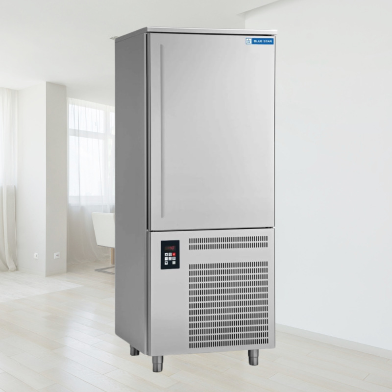 Chef placing food trays into a Blue Star BF10G Blast Freezer.