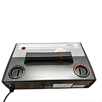 In-room: Compact Usha fan heater placed on the floor of a cozy bedroom.