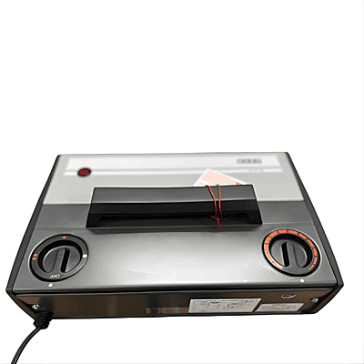 In-room: Compact Usha fan heater placed on the floor of a cozy bedroom.