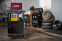 LUXOR AVJ42KBC Adjustable Steel A/V Cart - Cabinet with Pullout Trays