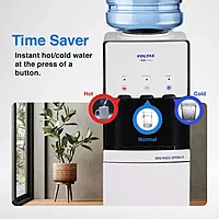 The elegant, white Voltas Water Dispenser ISI Mark Minimagic Spring RV+ in a modern kitchen.