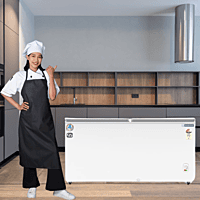 Person Stocking the Blue Star CF3-300MPW Deep Freezer with Frozen Goods Person Stocking the Blue Star CF3-300MPW Deep Freezer with Frozen Goods