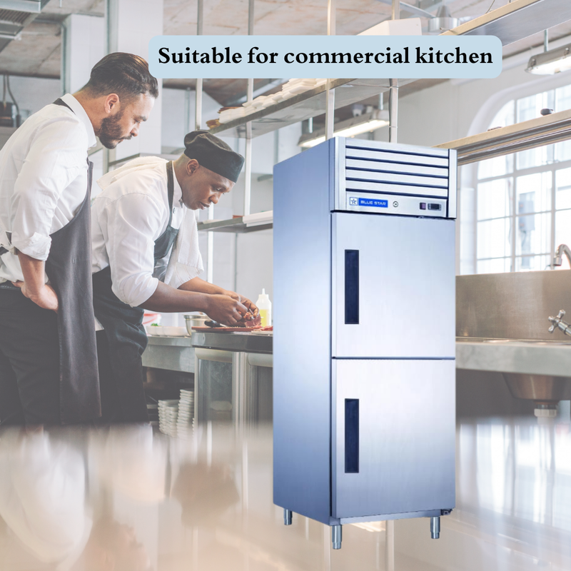 Chef easily accessing food from a Blue Star 2 Door Reach-In Chiller.