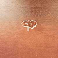 Brass Coated Om Shape Tilak Wearing on Forehead