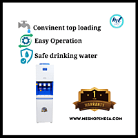 Person filling a glass with cold water from an Atlantis Big Plus Floor Standing Water Dispenser. Person filling a glass with cold water from an Atlantis Big Plus Floor Standing Water Dispenser.