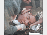 Suctioning an unresponsive patient.