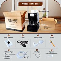 Atlantis Brew fresh milk coffee vending machine sitting on a countertop in a modern cafe setting.