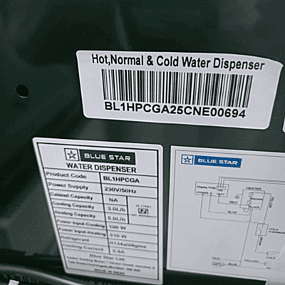 Blue Star bottom loading water dispenser BL1HPCGA standing in a modern office kitchen.