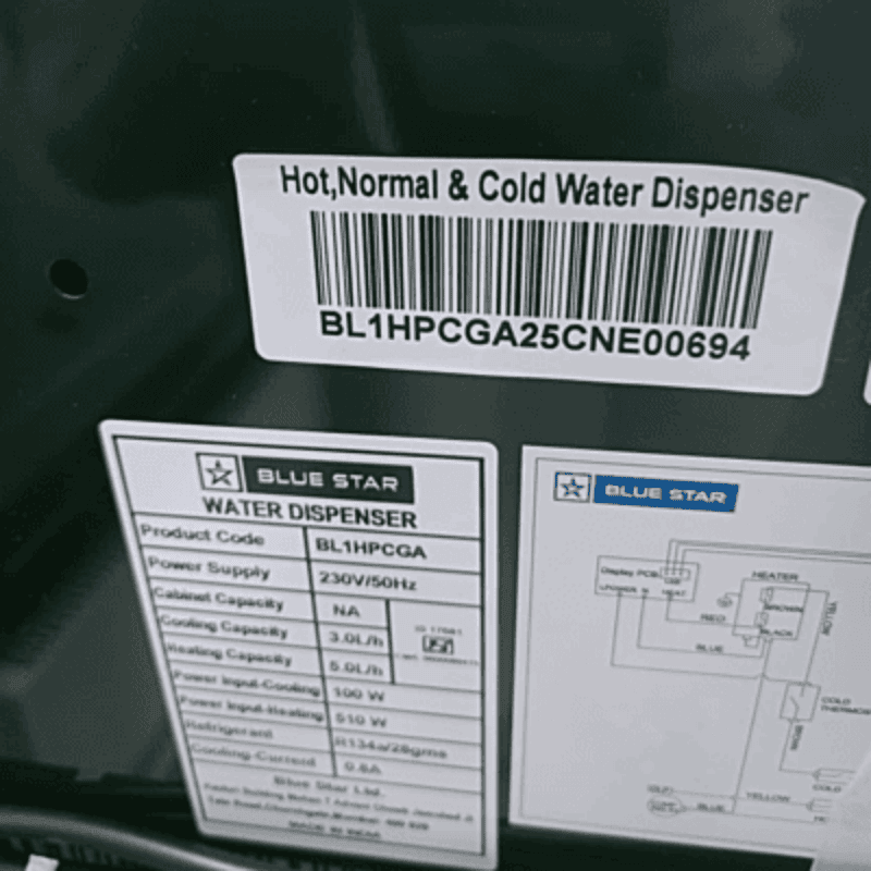 Blue Star bottom loading water dispenser BL1HPCGA standing in a modern office kitchen.