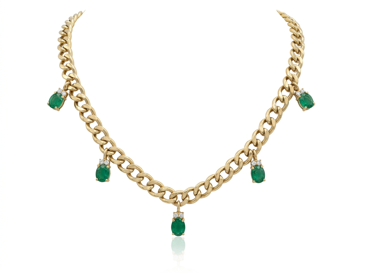 Collar grueso de oro con esmeraldas
