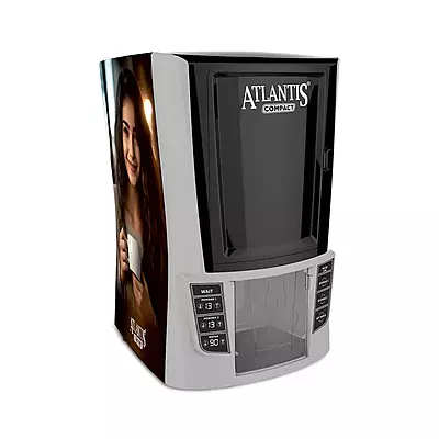 The sleek and Atlantis Compact 2 Lane Hot Beverage Vending Machine on an office countertop. The sleek and Atlantis Compact 2 Lane Hot Beverage Vending Machine on an office countertop.