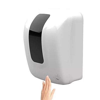 Dispensador automático de papel toalla en rollo instalado en baño institucional Dispensador automático de papel toalla en rollo instalado en baño institucional