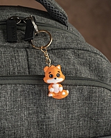 Fox in a Pumpkin Keychain Container
