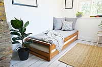 Wooden Sofa Cum Bed with Pull-Out Trundle – Space-Saving Daybed for Home & Guests Wooden Sofa Cum Bed with Pull-Out Trundle – Space-Saving Daybed for Home & Guests