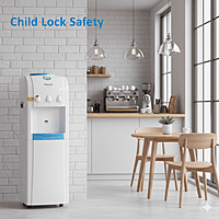 A person dispensing hot water from the child-safe tap of the Voltas Water Dispenser.