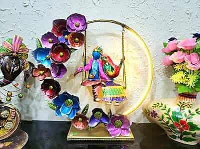 Handcrafted Radha Krishna Swing Decor with Floral Arch and LED Lighting