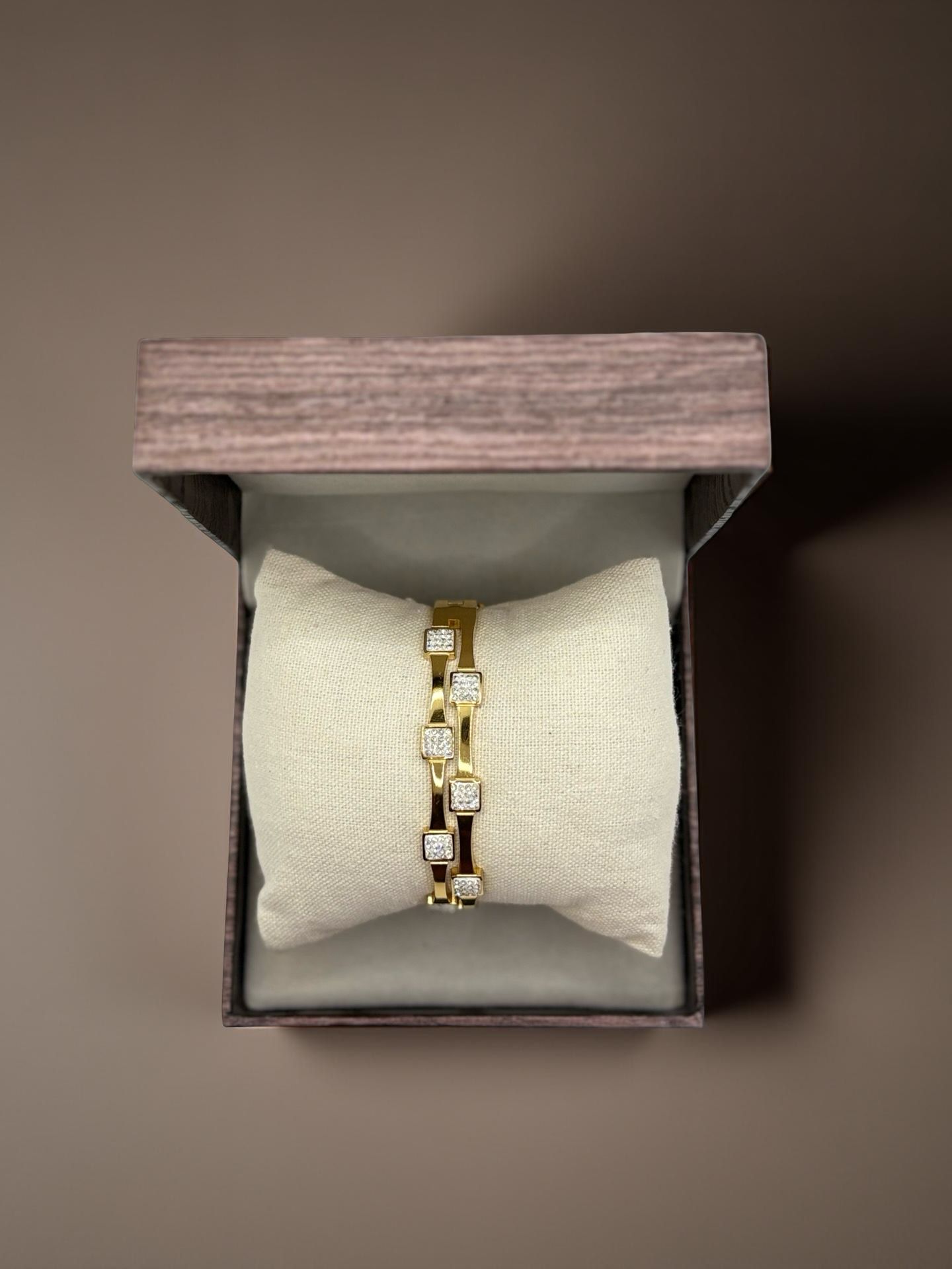 Modern Statement Gold Bangle with Square Zirconia Accents