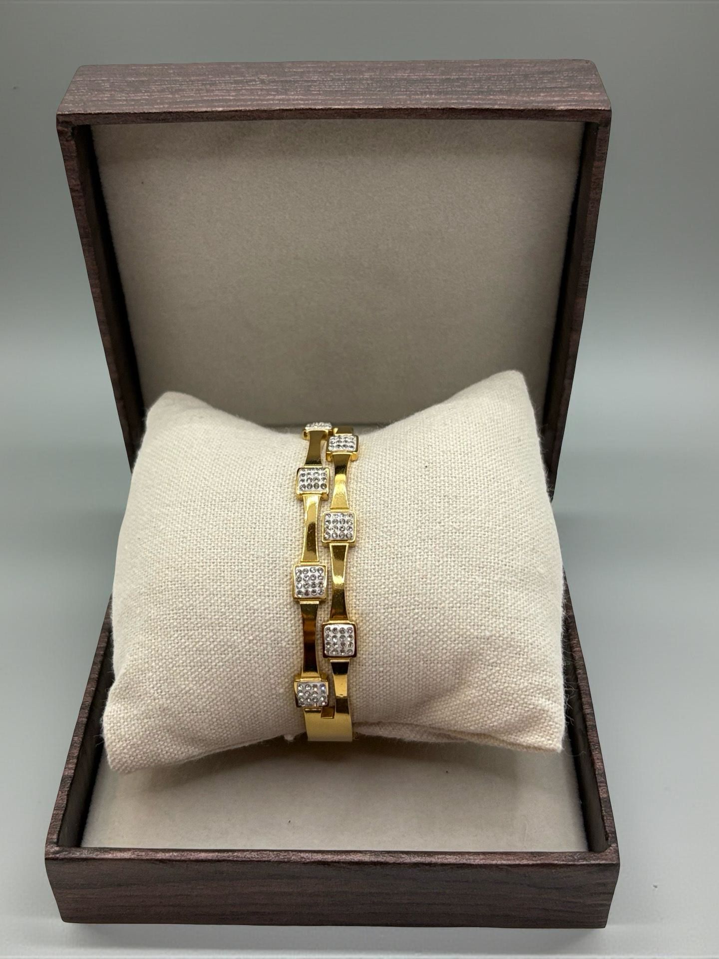 Modern Statement Gold Bangle with Square Zirconia Accents