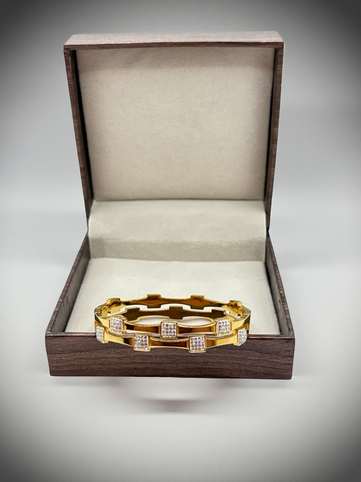 Modern Statement Gold Bangle with Square Zirconia Accents