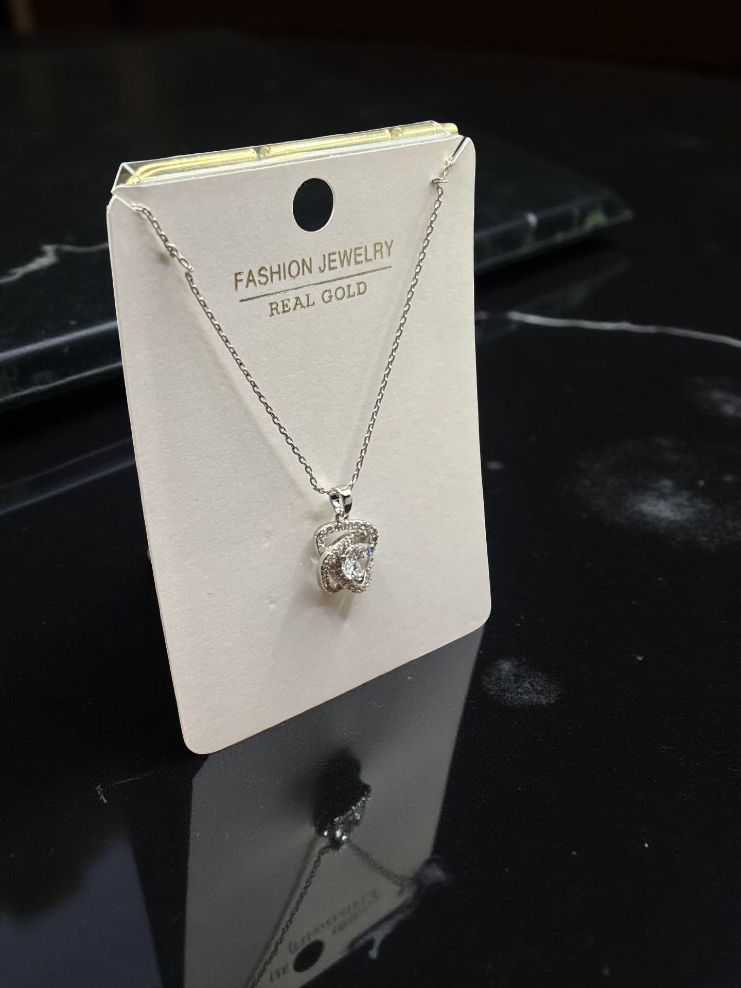 Elegant Twisted Knot Crystal Pendant Necklace