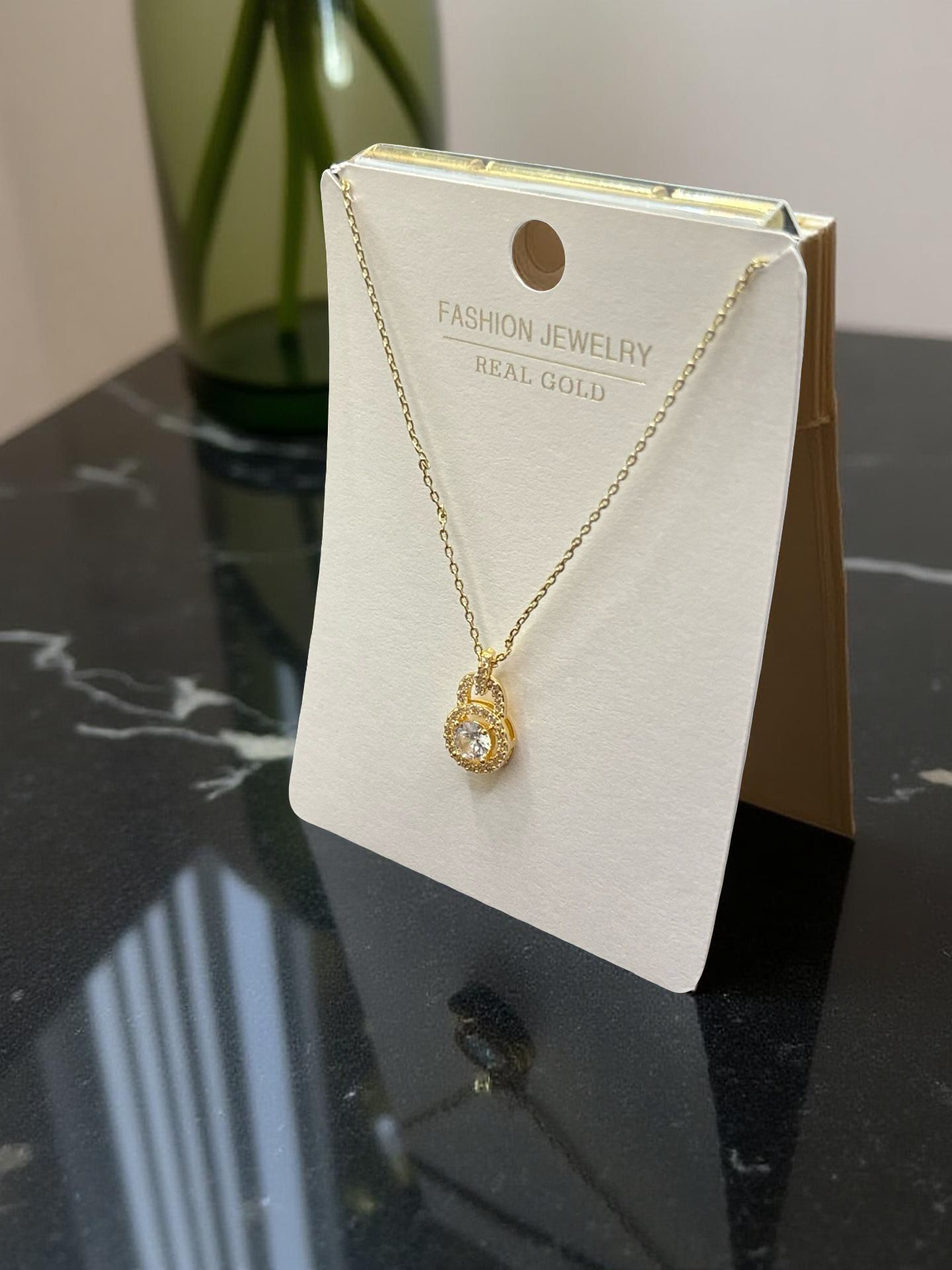 Interlocking Gold Knot Pendant Necklace