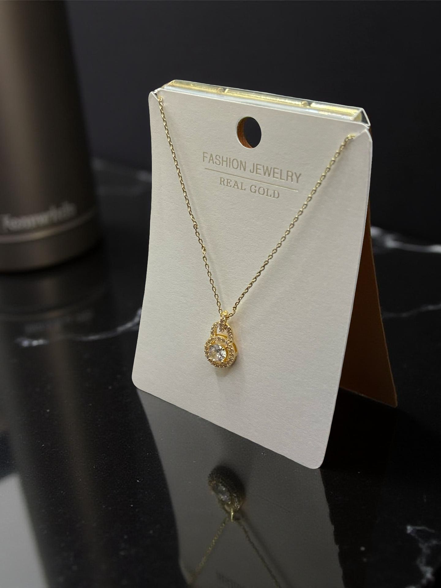 Interlocking Gold Knot Pendant Necklace