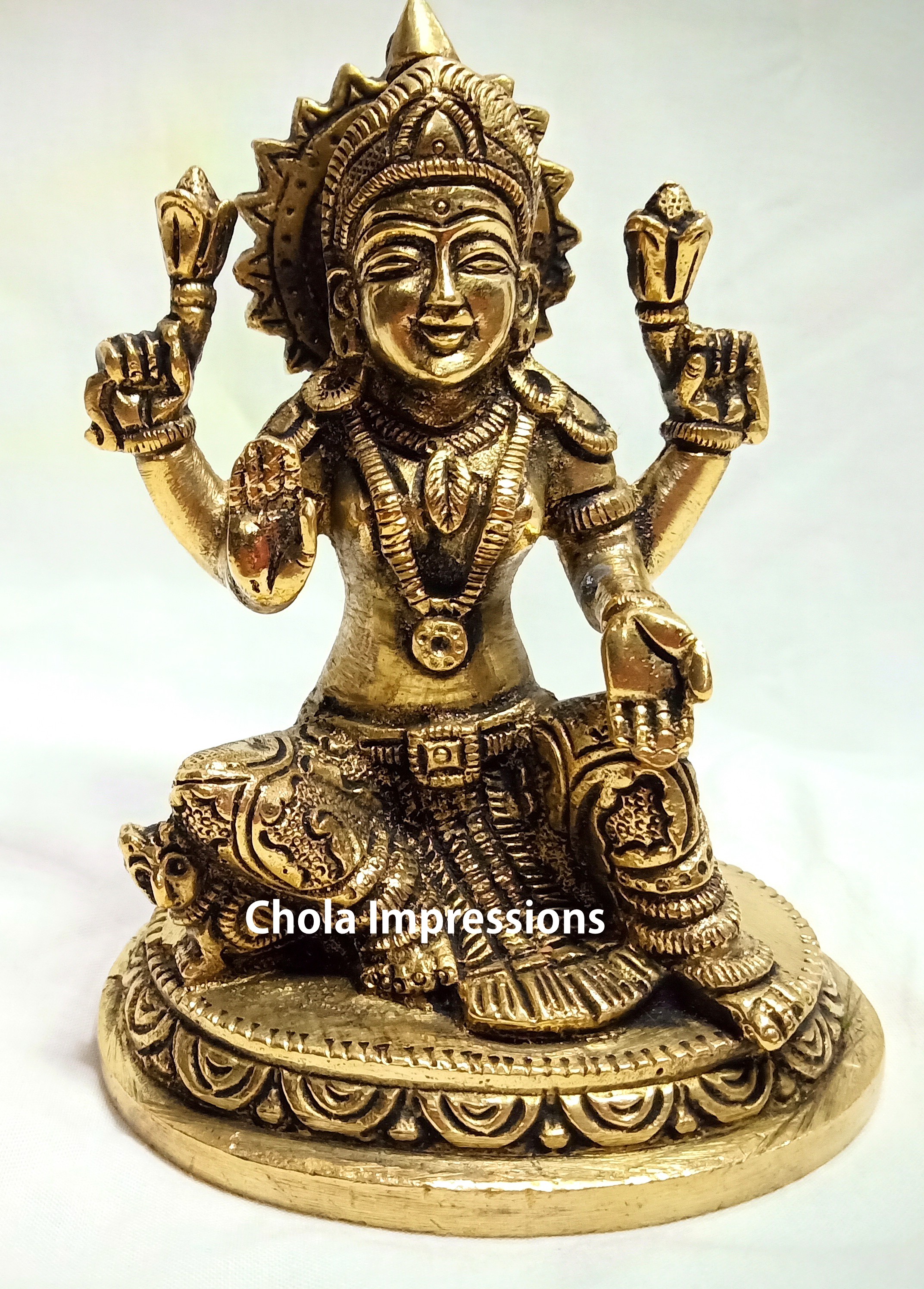 Lakshmi Devi Brass Statue with Chakram - 14 cm x 11 cm