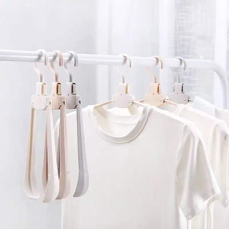TELESCOPIC SWING CLOTHES HANGER