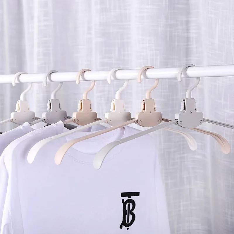 TELESCOPIC SWING CLOTHES HANGER