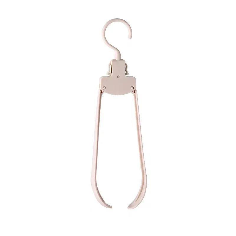TELESCOPIC SWING CLOTHES HANGER