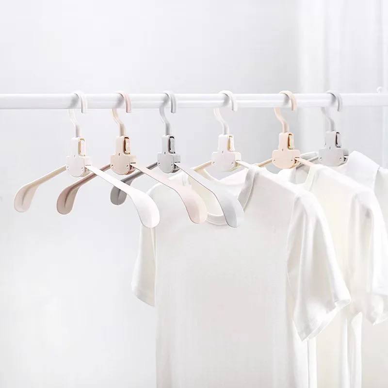 TELESCOPIC SWING CLOTHES HANGER