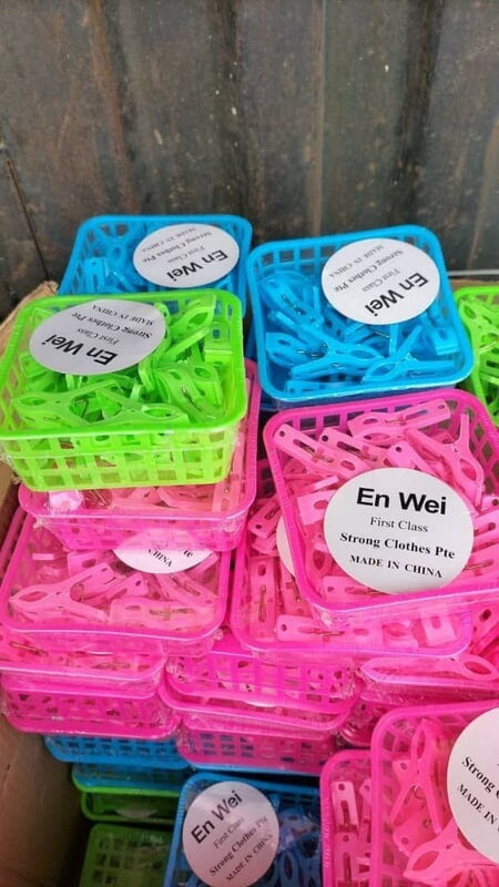 PLASTIC CLOTHES DRYING CLIPS WITH STORAGE BASKET