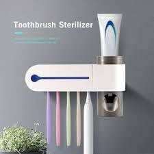 TOOTH BRUSH HOLDERS AND TOOTH PASTER DISPENSER WITH BRUSH STERILIZER