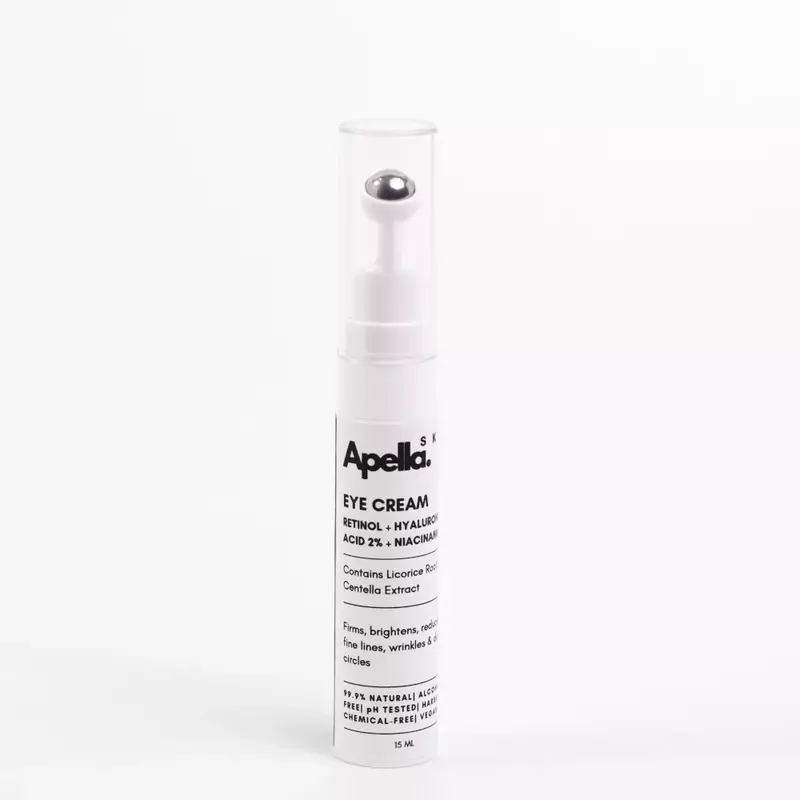 A bottle of Apella Skin eye cream, labelled with brightening and anti-aging benefits.