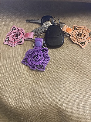 Geometric Rose Keychain: Embroidered Faux Leather Snap Tab