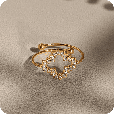 Delicate Zircons Clover Ring