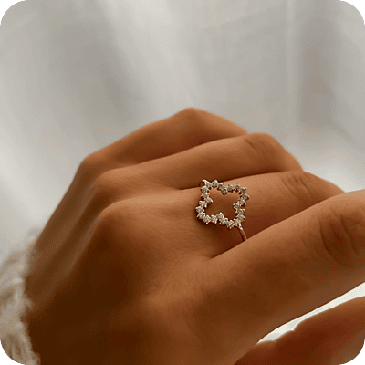 Delicate Zircons Clover Ring