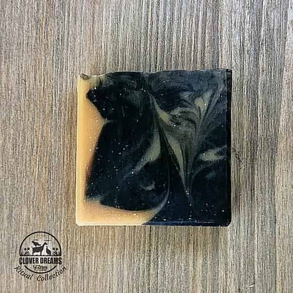 Unboxed Inner Wisdom goat milk soap with dramatic black and cream swirls