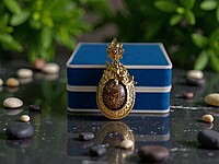 Elegant Gold Amulet