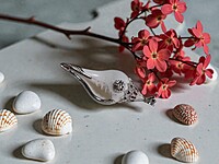Shell Pendant with Silver Accents and Red Gemstones