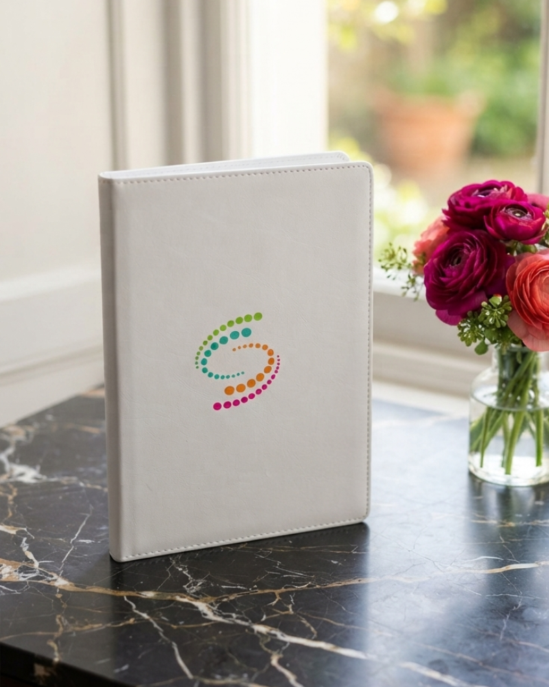 White Prestige Collection Meeting Notebook with custom color logo printed on the faux-leather cover
