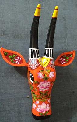 wooden painted cow head orange