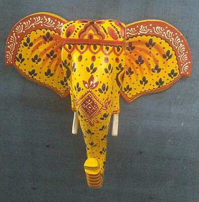wooden painted elephant head wall hanging yellow