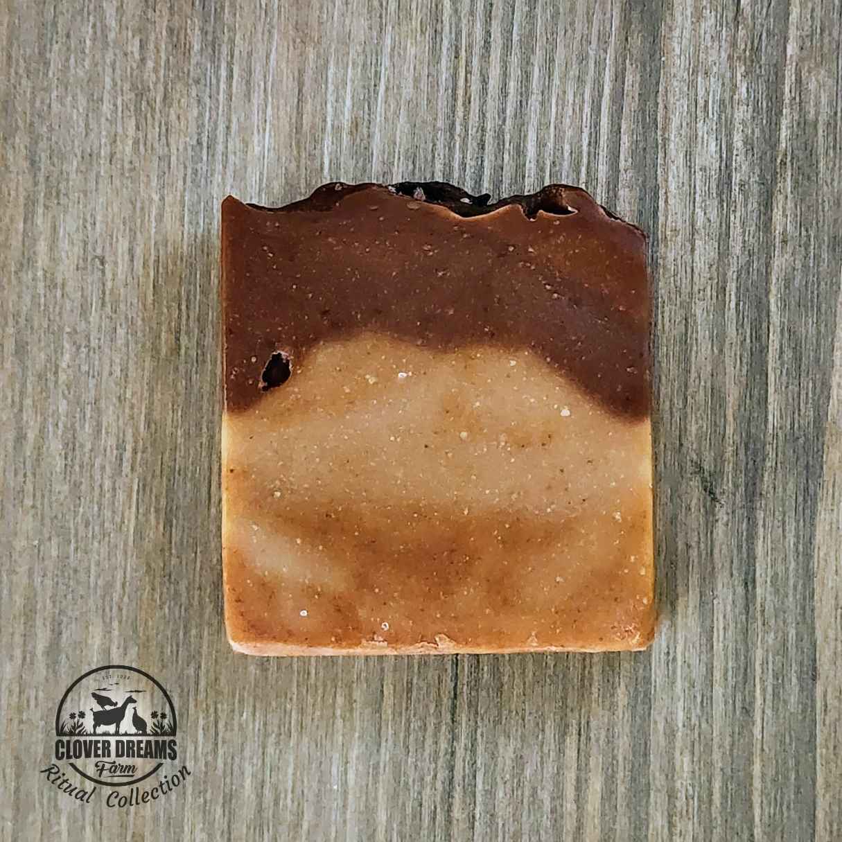 Unboxed Returning Light goat milk soap with golden and spiced brown layers