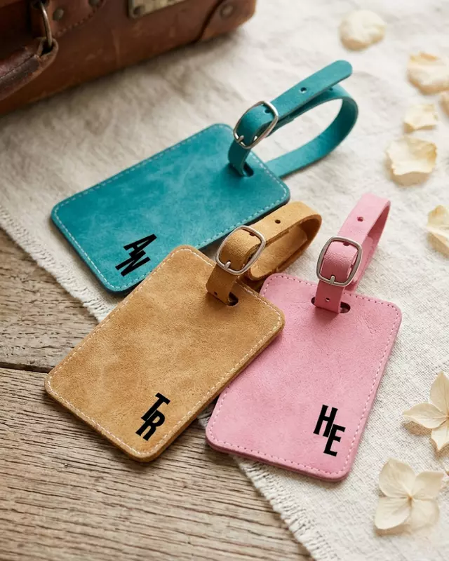 Signature Collection personalized luggage tag featuring custom faux leather travel accessory.